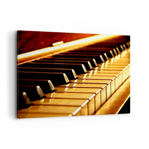 Obraz na płótnie - Klawiatura fortepianu w złotym oświetleniu - 100x70cm - Nieograniczone możliwości - Nowoczesna dekoracja ścienna do salonu, kuchni i sypialni ARTTOR