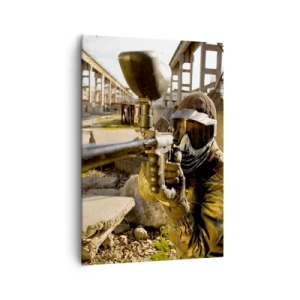 Obraz na płótnie - Gracz paintballa w stroju kamuflażowym celujący z markera - 70x100cm - I ty możesz zostać bohaterem - Nowoczesna dekoracja ścienna do salonu i sypialni ARTTOR