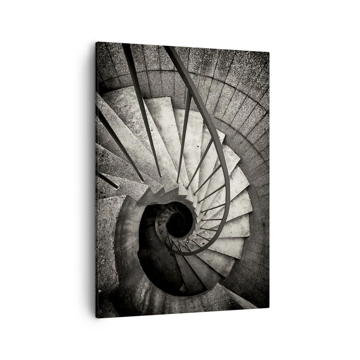 Obraz na płótnie - Czarno-biała fotografia spiralnych schodów w perspektywie z góry - 50x70cm - Schodami w górę, schodami w dół - Nowoczesna dekoracja ścienna do salonu, kuchni i sypialni ARTTOR
