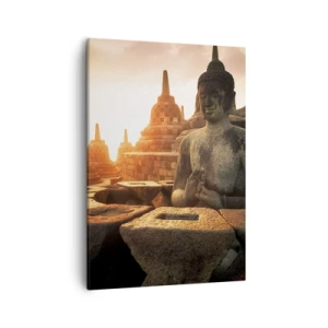 Obraz na płótnie - Posąg Buddy w świątyni Borobudur oświetlony blaskiem zachodzącego słońca - 50x70cm - Pogoda wielkiej mądrości - Nowoczesna dekoracja ścienna do salonu, kuchni i sypialni ARTTOR