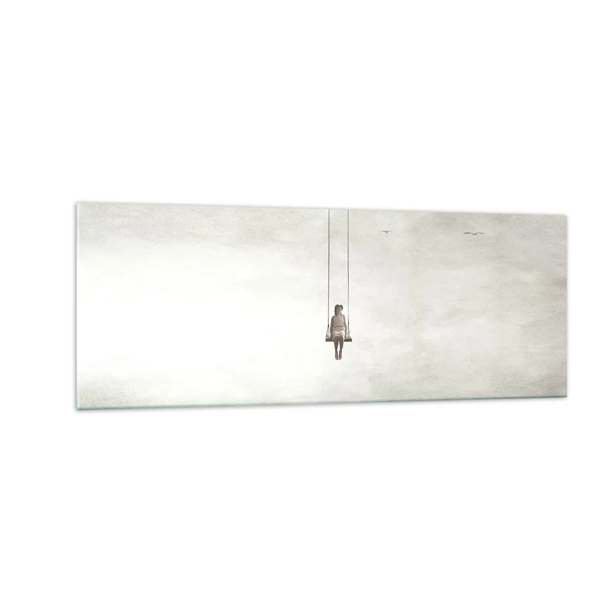 Obraz na szkle - Postać na huśtawce zawieszonej w przestrzeni - 140x50cm - Dziecko w nas - Nowoczesna dekoracja ścienna do salonu i sypialni ARTTOR