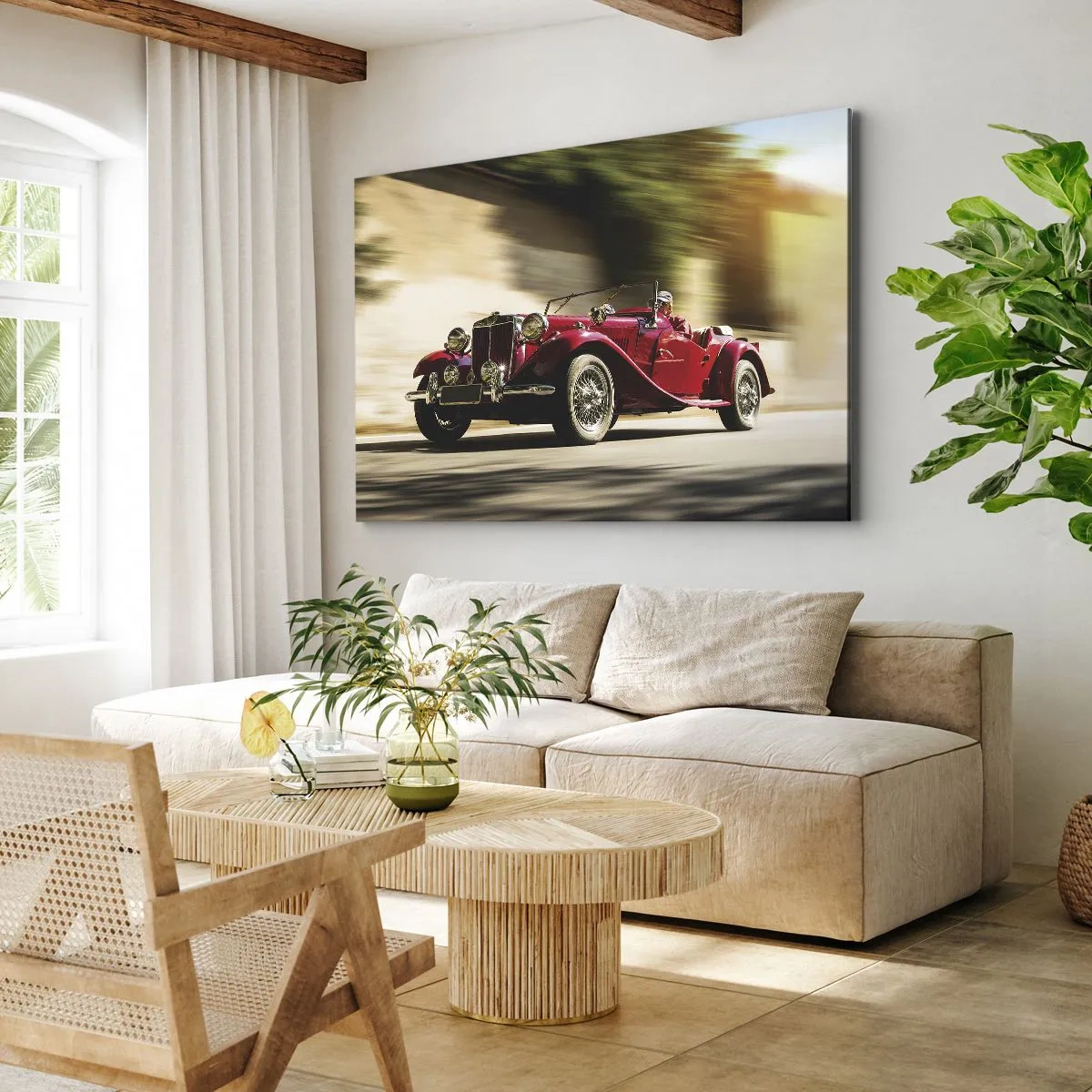 Obraz na płótnie - Czerwony klasyczny samochód w ruchu na słonecznej ulicy - 70x50cm - Piękniejszy niż Nike z Samotraki - Nowoczesna dekoracja ścienna do salonu i sypialni ARTTOR