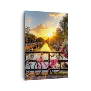 Obraz na płótnie - Rowery na moście w blasku zachodzącego słońca - 70x100cm - Wiosenny poranek w Amsterdamie - Nowoczesna dekoracja ścienna do salonu i sypialni ARTTOR