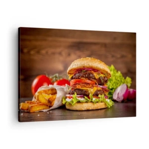 Obraz na płótnie - Apetyczny burger z dodatkami - 70x50cm - Zakazany owoc - Nowoczesna dekoracja ścienna do salonu i sypialni ARTTOR