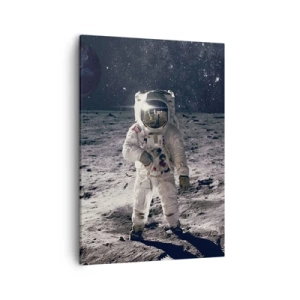 Obraz na płótnie - Astronauta stojący na powierzchni Księżyca z widokiem na Ziemię - 50x70cm - Pozdrowienia z Księżyca - Nowoczesna dekoracja ścienna do salonu, kuchni i sypialni ARTTOR