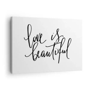 Obraz na płótnie - Czarny napis love is beautiful na białym tle - 70x50cm - Czytaj i powtarzaj - Nowoczesna dekoracja ścienna do salonu i sypialni ARTTOR