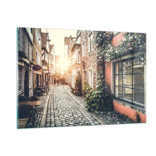 Obraz na szkle - Urokliwa uliczka z kamienicami oświetlona zachodem słońca - 120x80cm - Różany zaułek w różowym blasku - Nowoczesna dekoracja ścienna do salonu, kuchni i sypialni ARTTOR