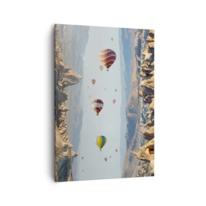 Obraz na płótnie - Kolorowe balony unoszące się nad skalistym krajobrazem Kapadocji - 50x70cm - Tu wszystko jest możliwe - Nowoczesna dekoracja ścienna do salonu, kuchni i sypialni ARTTOR