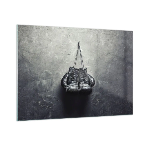 Obraz na szkle - Czarne rękawice bokserskie zawieszone na ścianie - 100x70cm - Czas walki i czas pokoju - Nowoczesna dekoracja ścienna do salonu, kuchni i sypialni ARTTOR