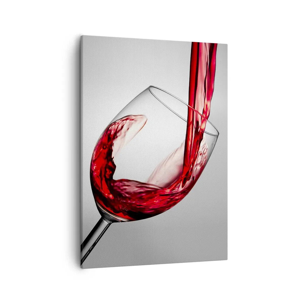 Obraz na płótnie - Czerwone wino nalewane do kieliszka, rozlewające się w szklance - 50x70cm - Barwa - ruch - dźwięk - Nowoczesna dekoracja ścienna do salonu, kuchni i sypialni ARTTOR