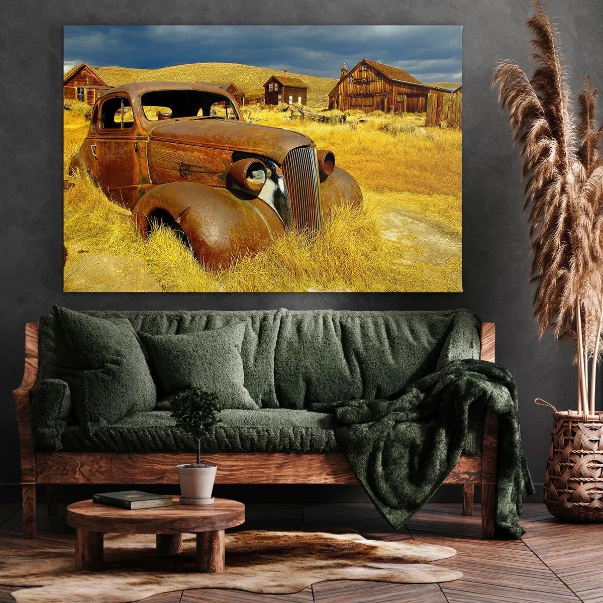 Obraz na płótnie - Stary zardzewiały samochód na tle opuszczonych drewnianych chat - 100x70cm - Zasłużony odpoczynek - Nowoczesna dekoracja ścienna do salonu, kuchni i sypialni ARTTOR