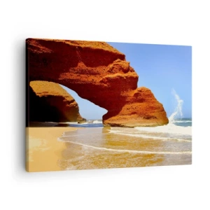 Obraz na płótnie - Naturalny łuk skalny na plaży z błękitnym niebem i falami - 70x50cm - Woda i wiatr przez tysiące lat - Nowoczesna dekoracja ścienna do salonu i sypialni ARTTOR