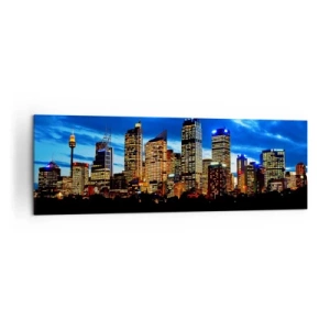 Obraz na płótnie - Panorama nocnego miasta z podświetlonymi wieżowcami nad wodą - 160x50cm - Noc świateł i barw - Nowoczesna dekoracja ścienna do salonu i sypialni ARTTOR