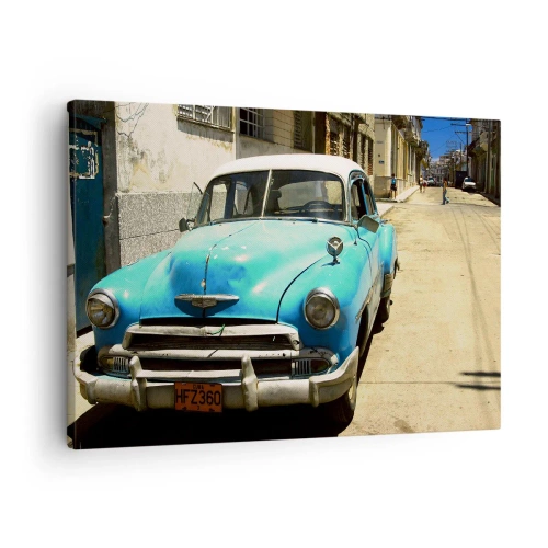 Obraz na płótnie - Niebieski klasyczny samochód na ulicy w słoneczny dzień - 70x50cm - Evviva Cuba! - Nowoczesna dekoracja ścienna do salonu i sypialni ARTTOR