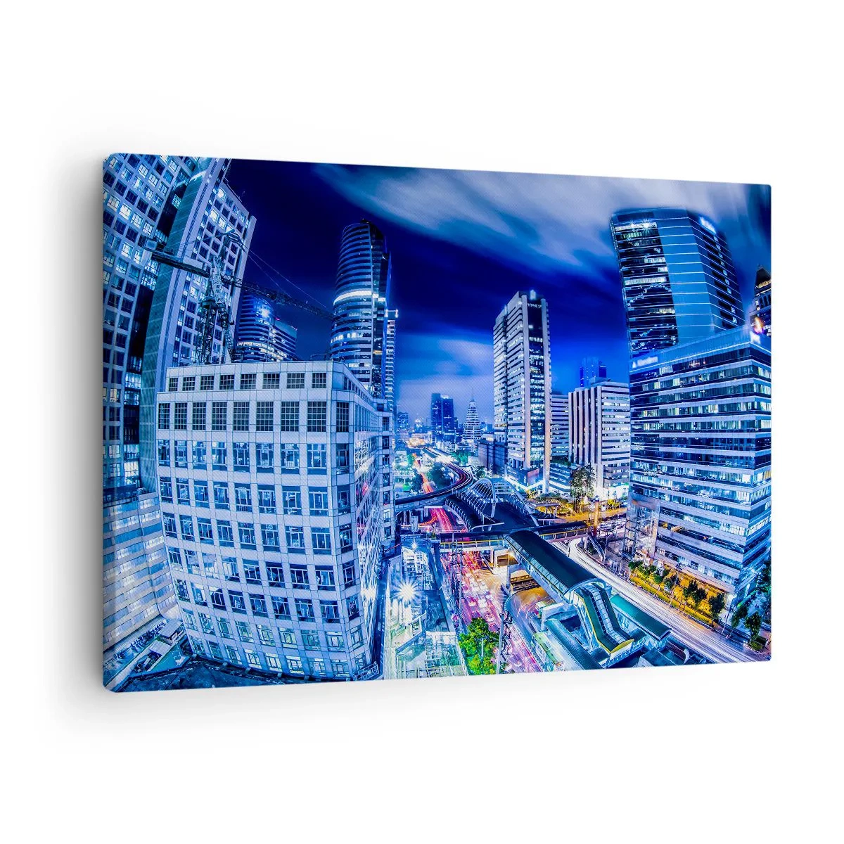 Obraz na płótnie - Nocna panorama miasta z drapaczami chmur i światłami ulic - 70x50cm - Rytmy nocnego miasta - Nowoczesna dekoracja ścienna do salonu i sypialni ARTTOR