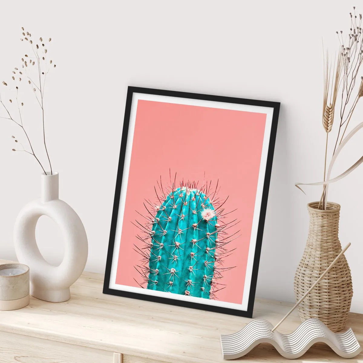 Plakat w czarnej ramie - Turkusowy kaktus na różowym tle - 50x70cm - Tylko patrz - Nowoczesna dekoracja ścienna do salonu i sypialni ARTTOR