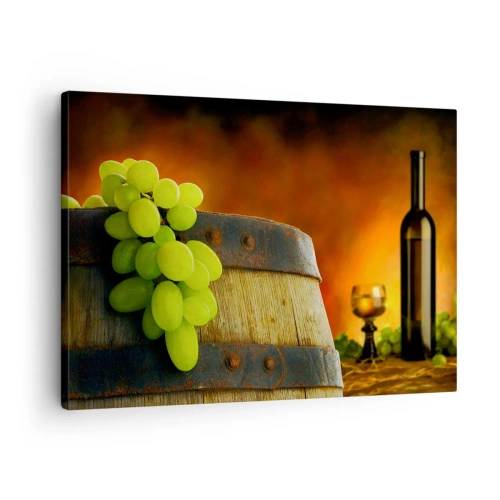 Obraz na płótnie - Winogrona na beczce z winem w tle w ciepłej kolorystyce - 70x50cm - Martwa natura z butelką wina i kiścią winogron - Nowoczesna dekoracja ścienna do salonu i sypialni ARTTOR