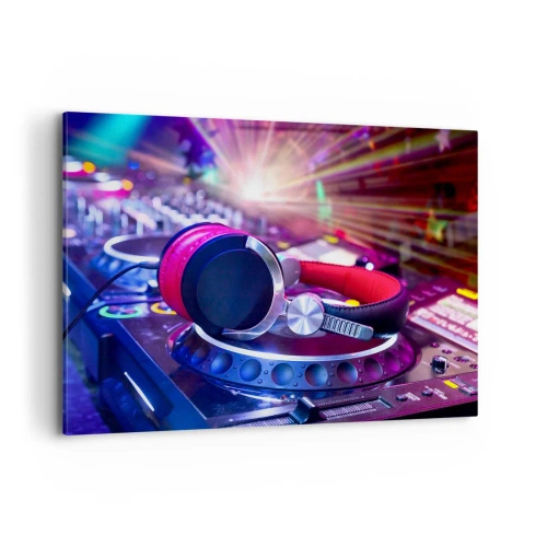 Obraz na płótnie - Słuchawki DJ na konsolecie oświetlone reflektorami na imprezie - 100x70cm - Będzie, będzie się działo - Nowoczesna dekoracja ścienna do salonu, kuchni i sypialni ARTTOR