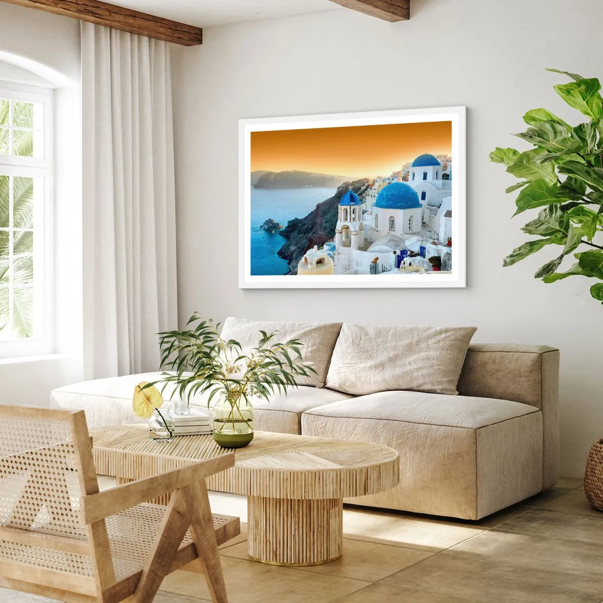 Plakat w białej ramie - Santorini - przytulone do skał - 100x70 cm