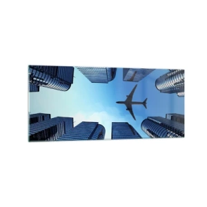 Obraz na szkle - Samolot lecący nad nowoczesnymi wieżowcami w centrum miasta - 120x50cm - Widok ze szklanego wąwozu - Nowoczesna dekoracja ścienna do salonu i sypialni ARTTOR