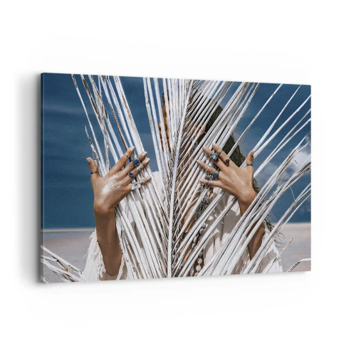 Obraz na płótnie - Kobieta ukryta za palmowymi liśćmi z pierścieniami na dłoniach - 100x70cm - Dziewczyna szamana? - Nowoczesna dekoracja ścienna do salonu, kuchni i sypialni ARTTOR