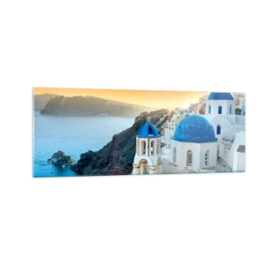 Obraz na szkle - Widok na Santorini z białymi budynkami i błękitnym morzem - 140x50cm - Santorini - przytulone do skał - Nowoczesna dekoracja ścienna do salonu i sypialni ARTTOR