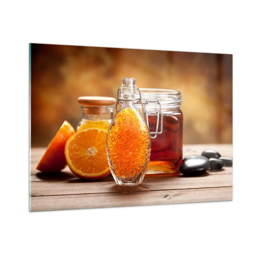 Obraz na szkle - Butelka z olejem i pomarańczą na drewnianym stole - 100x70cm - Słoneczne smaki i aromaty - Nowoczesna dekoracja ścienna do salonu, kuchni i sypialni ARTTOR