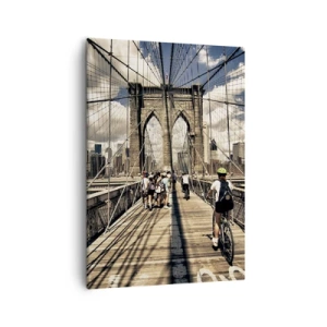 Obraz na płótnie - Brooklyn Bridge z pieszymi i rowerzystami w tle nowojorskich wieżowców - 50x70cm - Wprost do serca miasta - Nowoczesna dekoracja ścienna do salonu, kuchni i sypialni ARTTOR