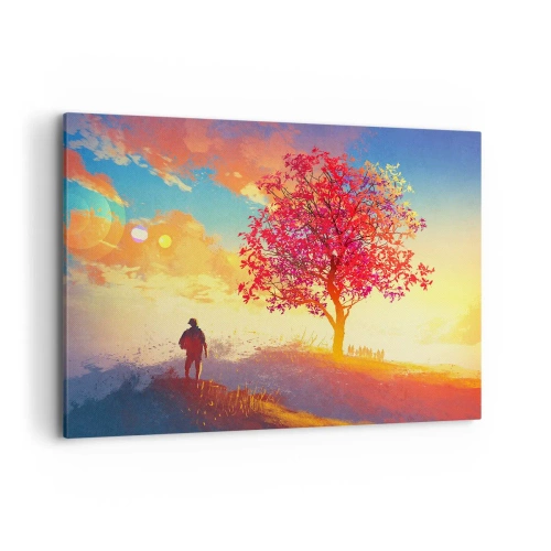 Obraz na płótnie - Postać na wzgórzu obok kolorowego drzewa w świetle zachodzącego słońca - 100x70cm - Pielgrzym u celu - Nowoczesna dekoracja ścienna do salonu, kuchni i sypialni ARTTOR