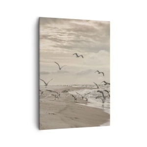 Obraz na płótnie - Mewy na plaży podczas lotu nad brzegiem morza - 50x70cm - Morza szum, ptaków śpiew - Nowoczesna dekoracja ścienna do salonu, kuchni i sypialni ARTTOR