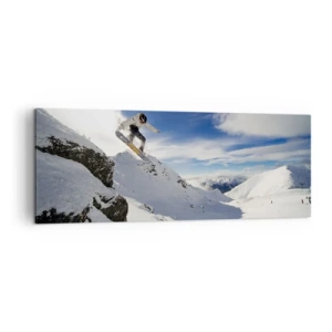 Obraz na płótnie - Snowboardzista skaczący z urwiska na tle ośnieżonych gór - 140x50cm - Wolność bez granic - Nowoczesna dekoracja ścienna do salonu i sypialni ARTTOR
