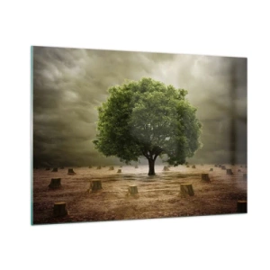 Obraz na szkle - Zielone drzewo otoczone pniami na tle ponurego nieba - 100x70cm - Cała nadzieja - Nowoczesna dekoracja ścienna do salonu, kuchni i sypialni ARTTOR