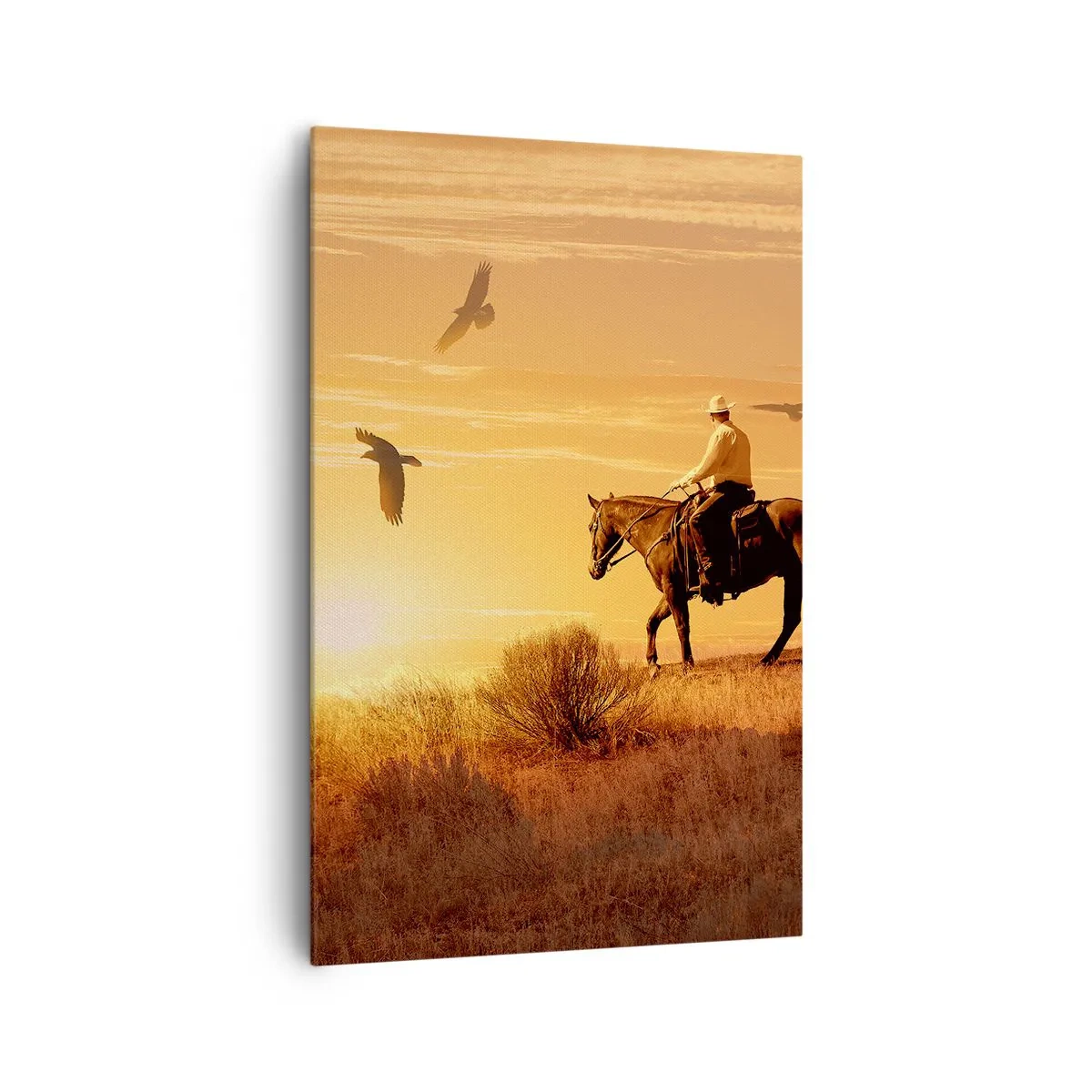Obraz na płótnie - Jezdziec na koniu o zachodzie słońca na tle prerii - 80x120cm - Samotnie przez prerię - Nowoczesna dekoracja ścienna do salonu i sypialni ARTTOR