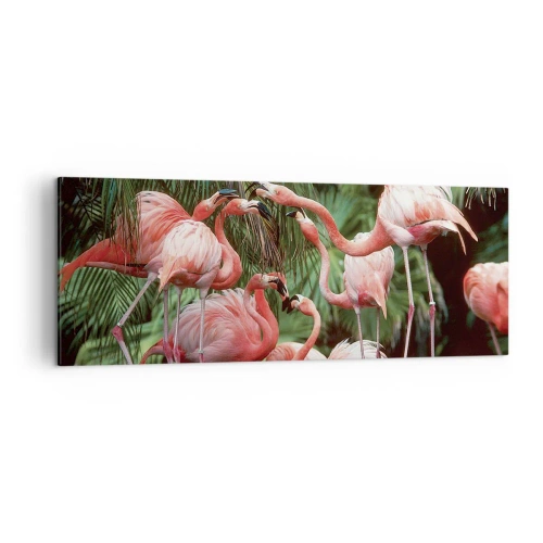 Obraz na płótnie - Grupa flamingów w tropikalnym otoczeniu palm - 140x50cm - Popołudniowe ploteczki - Nowoczesna dekoracja ścienna do salonu i sypialni ARTTOR