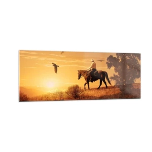 Obraz na szkle - Jezdziec na koniu o zachodzie słońca na tle prerii - 140x50cm - Samotnie przez prerię - Nowoczesna dekoracja ścienna do salonu i sypialni ARTTOR
