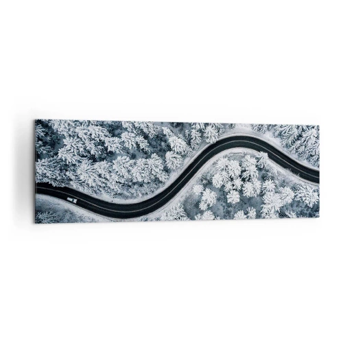 Obraz na płótnie - Zakręcona droga w zimowym lesie z lotu ptaka - 160x50cm - Przez zimowy las - Nowoczesna dekoracja ścienna do salonu i sypialni ARTTOR