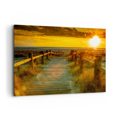 Obraz na płótnie - Drewniana ścieżka prowadząca na plażę w blasku zachodzącego słońca - 100x70cm - Skąpane w starym złocie - Nowoczesna dekoracja ścienna do salonu, kuchni i sypialni ARTTOR