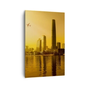 Obraz na płótnie - Panorama miasta o zachodzie słońca z wieżowcami i samolotem - 80x120cm - Złote miasto - Nowoczesna dekoracja ścienna do salonu i sypialni ARTTOR