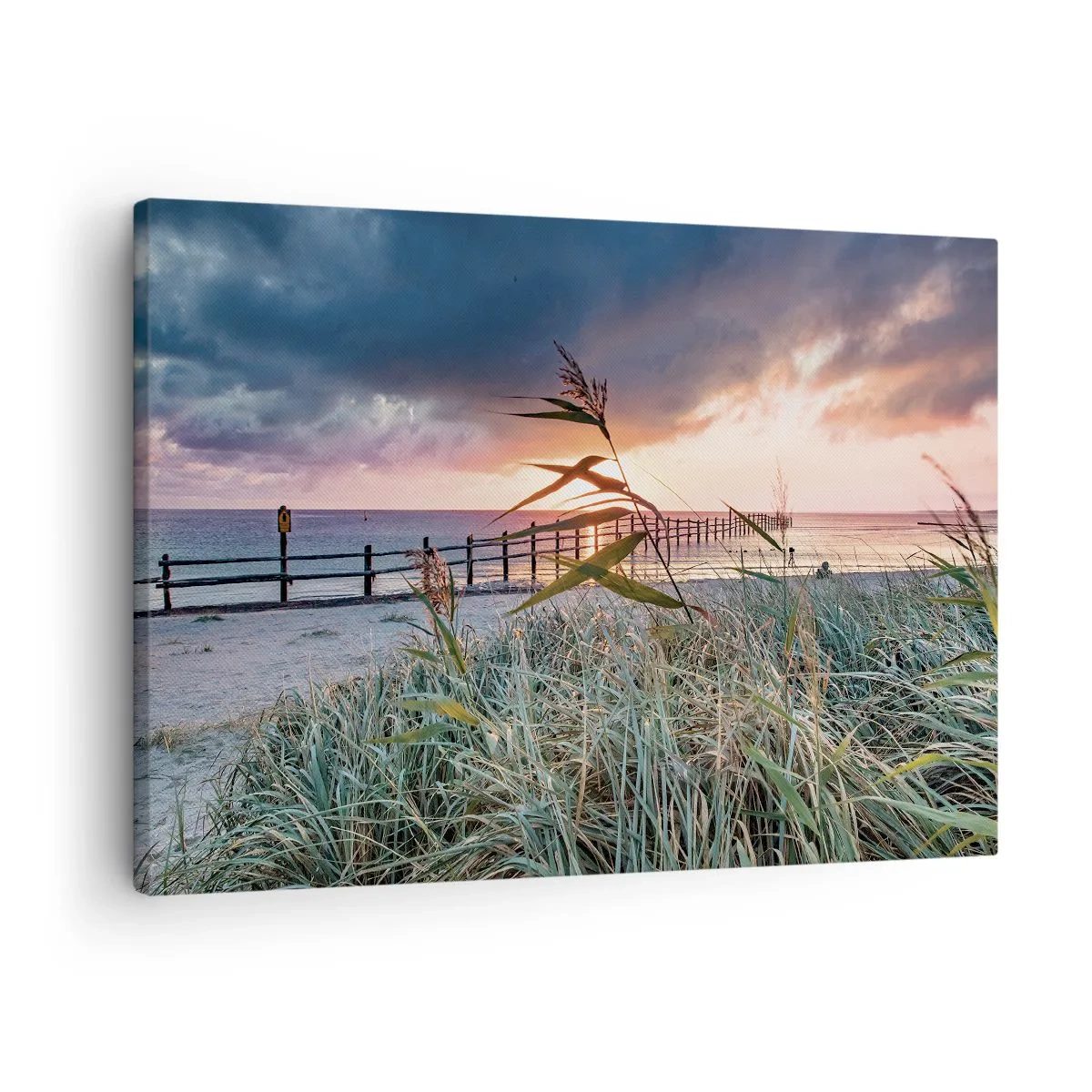 Obraz na płótnie - Plaża o zachodzie słońca z trawami na pierwszym planie - 70x50cm - Nie przemija z wiatrem - Nowoczesna dekoracja ścienna do salonu i sypialni ARTTOR