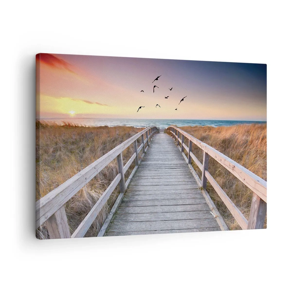 Obraz na płótnie - Drewniany pomost prowadzący na plażę o zachodzie słońca - 70x50cm - Przestrzeń wzlotów - Nowoczesna dekoracja ścienna do salonu i sypialni ARTTOR