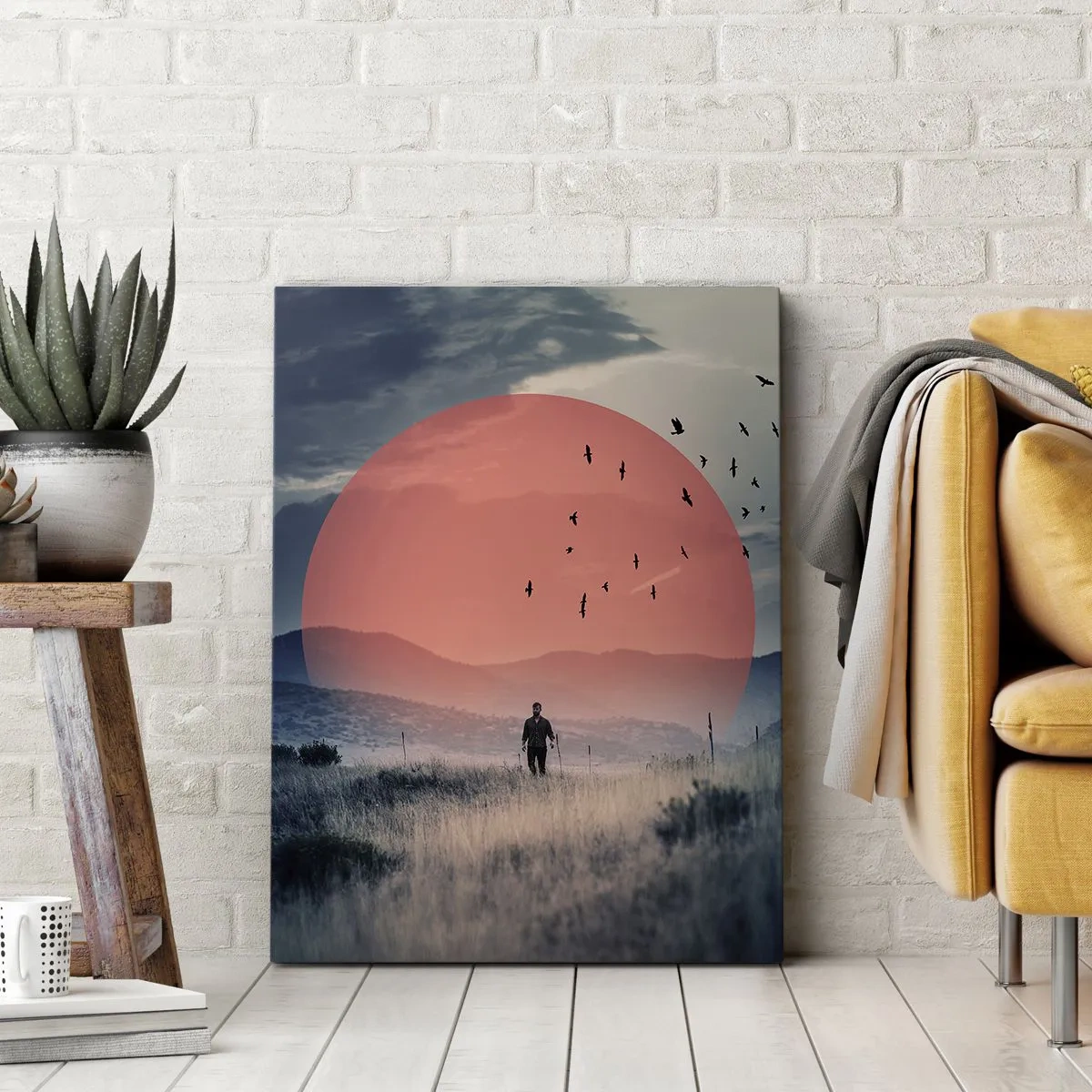 Obraz na płótnie - Sylwetka mężczyzny na polu z wielkim czerwonym słońcem w tle - 70x100cm - W swoich żywiołach - Nowoczesna dekoracja ścienna do salonu i sypialni ARTTOR