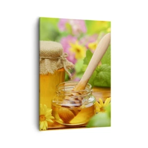 Obraz na płótnie - Słoik z miodem i drewnianą łyżką na tle kwiatów - 50x70cm - Słodko i kwiatowo - Nowoczesna dekoracja ścienna do salonu, kuchni i sypialni ARTTOR