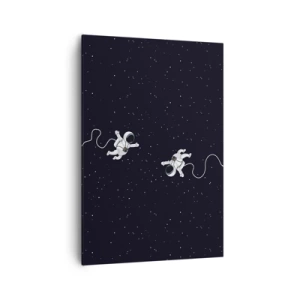 Obraz na płótnie - Astronauci unoszący się w kosmosie na tle gwiazd - 70x100cm - Kosmiczny pląs - Nowoczesna dekoracja ścienna do salonu i sypialni ARTTOR