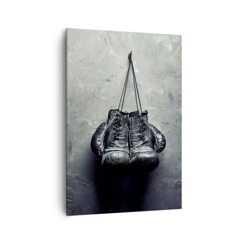 Obraz na płótnie - Stare rękawice bokserskie na tle ściany - 70x100cm - Czas walki i czas pokoju - Nowoczesna dekoracja ścienna do salonu i sypialni ARTTOR