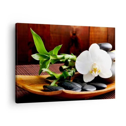 Obraz na płótnie - Poddaj się dotykowi natury - Biała orchidea z bambusem na tle kamieni w stylu Zen - 70x50cm