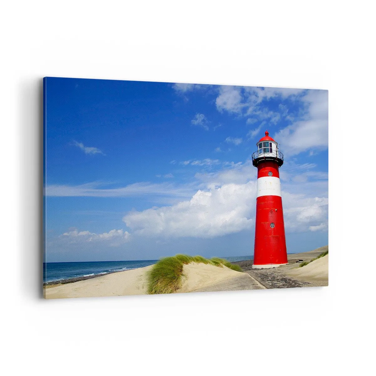 Obraz na płótnie - Czerwona latarnia morska na plaży pod błękitnym niebem - 100x70cm - Wymarzona samotnia - Nowoczesna dekoracja ścienna do salonu, kuchni i sypialni ARTTOR