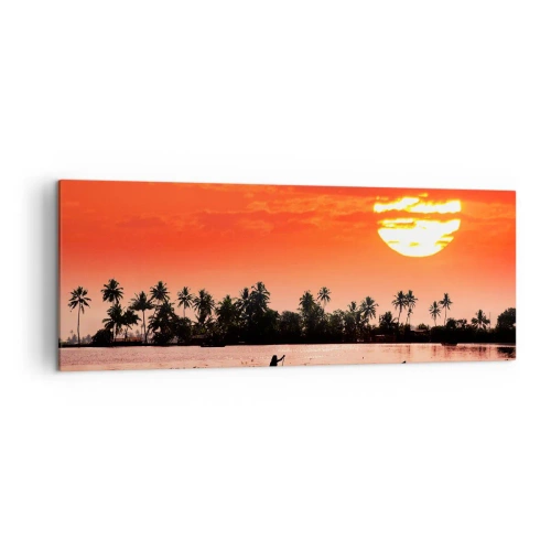 Obraz na płótnie - Tropikalny zachód słońca z łodzią na tle palm - 140x50cm - Spokój tropików o zachodzie - Nowoczesna dekoracja ścienna do salonu i sypialni ARTTOR