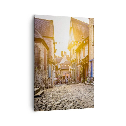 Obraz na płótnie - Urokliwa uliczka z kamiennym brukiem w świetle słońca - 70x100cm - Biały duch miasteczka - Nowoczesna dekoracja ścienna do salonu i sypialni ARTTOR