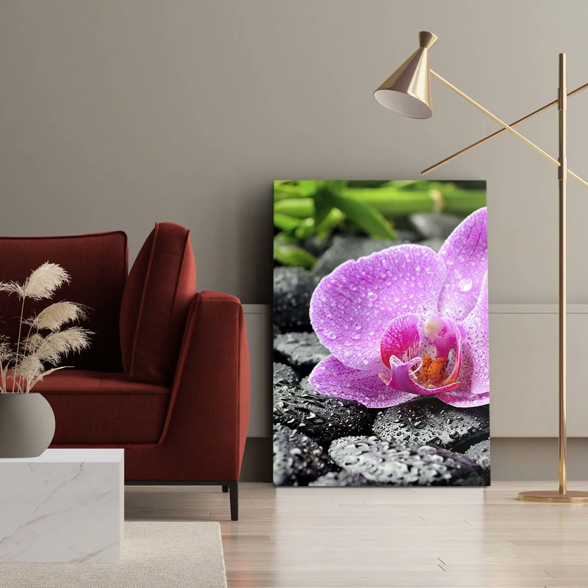 Obraz na płótnie - Różowa orchidea na mokrych czarnych kamieniach z zielonymi liśćmi - 70x100cm - Jak otwarte serce - Nowoczesna dekoracja ścienna do salonu i sypialni ARTTOR