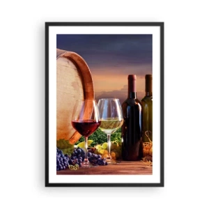 Plakat w czarnej ramie - Butelki i kieliszki wina na tle beczki i zachodu słońca - 50x70cm - Tu życie ma smak - Nowoczesna dekoracja ścienna do salonu i sypialni ARTTOR